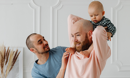 Happy gay familiy surrogacy at fertility specialists wa